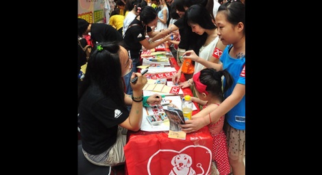 Animals Asia’s booth interests a huge number of visitors.