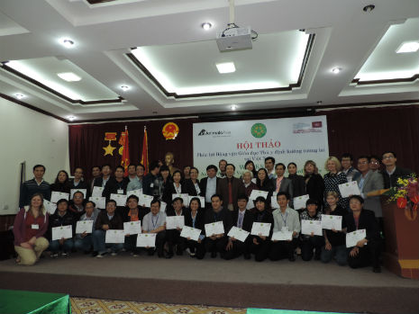 group shot of workshop participants with their certificates